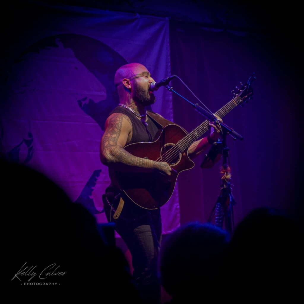 Live Music Photograph of Nahko, A singer songwriter and guitarist